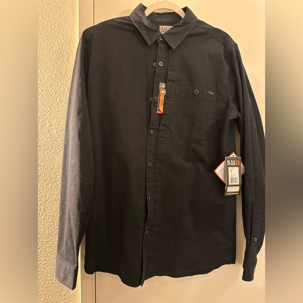 5.11 medium, black legend long sleeve shirt.